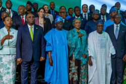 President Tinubu and Prof Oramah.jpg